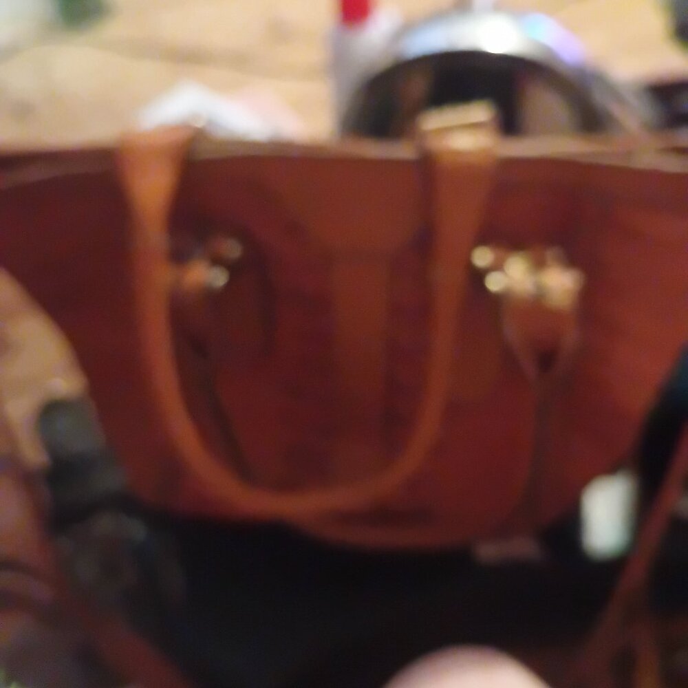 J Toma's handbag
